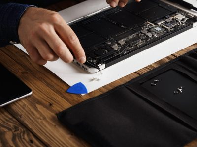 hand that uses angled esd tweezers remove dust from electronic boards broken slim computer laptop fix it make work again scaled hand that uses angled esd tweezers remove dust from electronic boards broken slim computer laptop fix it make work again scaled