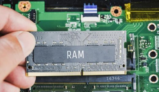ram random access memory ddr4 technician hand with laptop motherboard background 41472 967